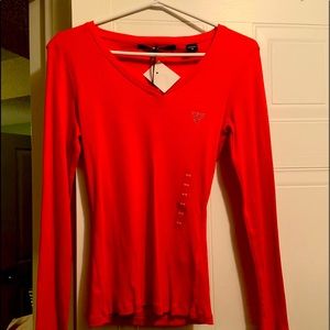 Brand new guess long sleeve shirt, size Medium